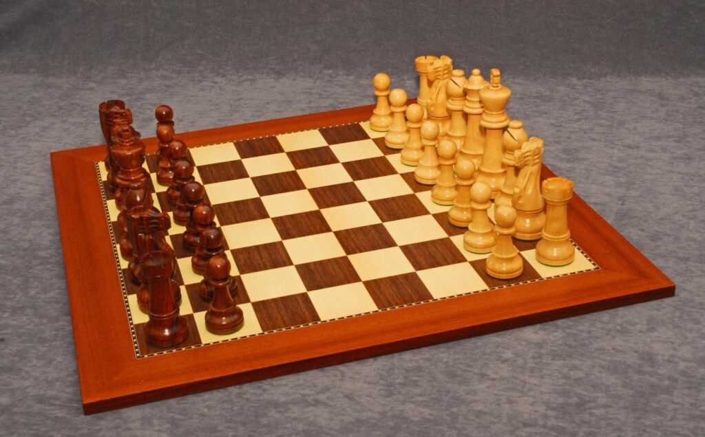 Staunton Deluxe Chessmen and Champion Board